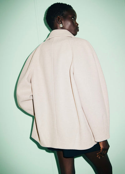 Manteau court col à revers