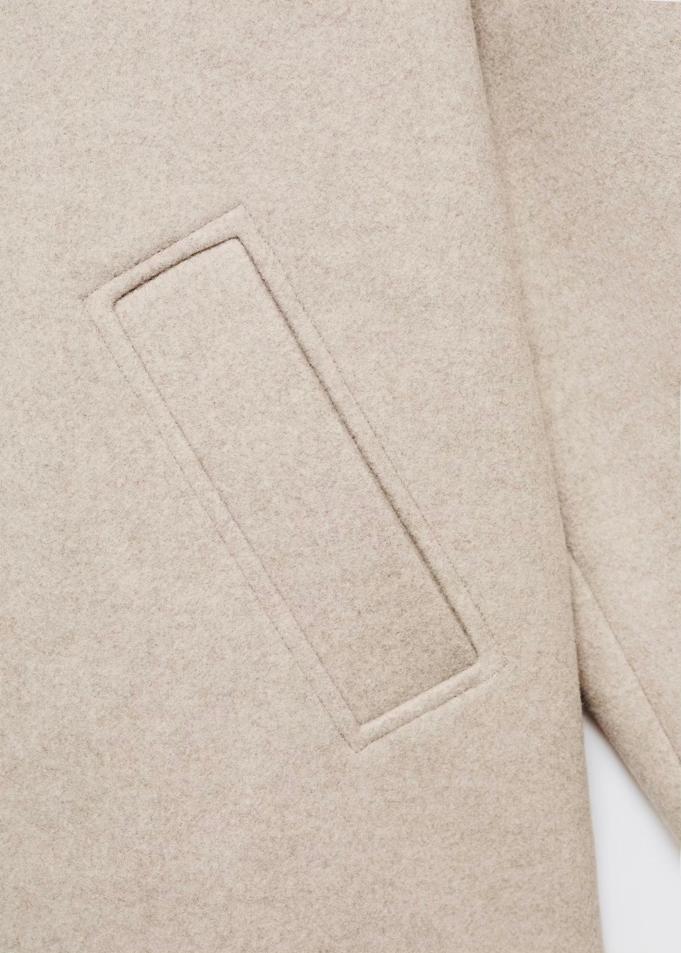 Manteau court col à revers