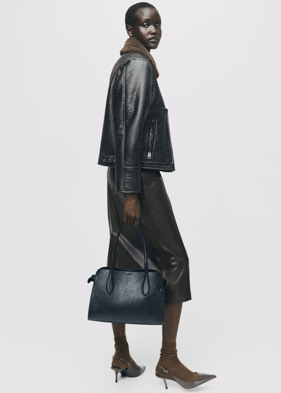 Veste similicuir col effet mouton