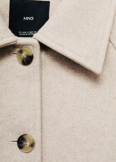 Manteau court col à revers