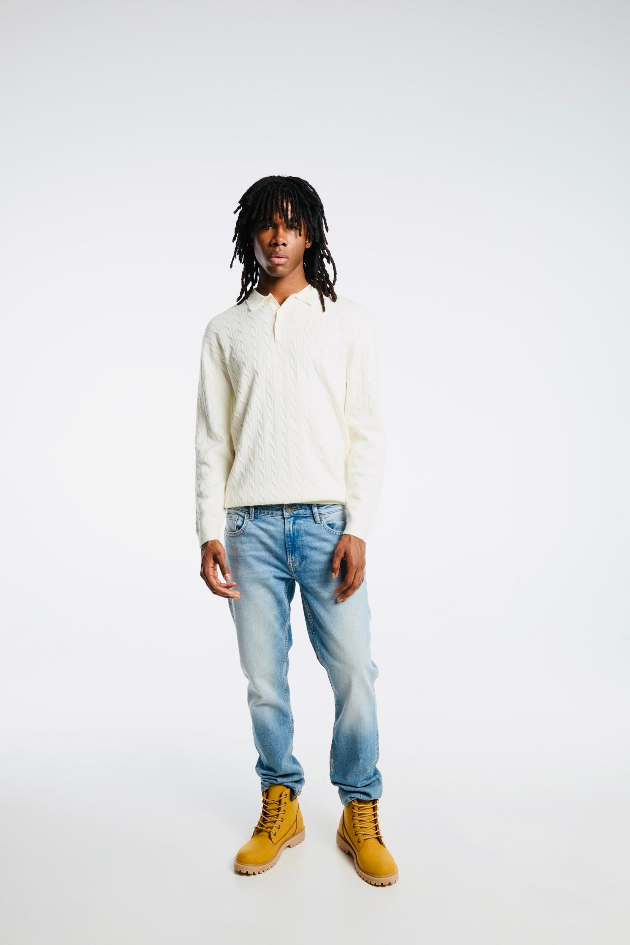 Pull avec Patte de Boutonnage