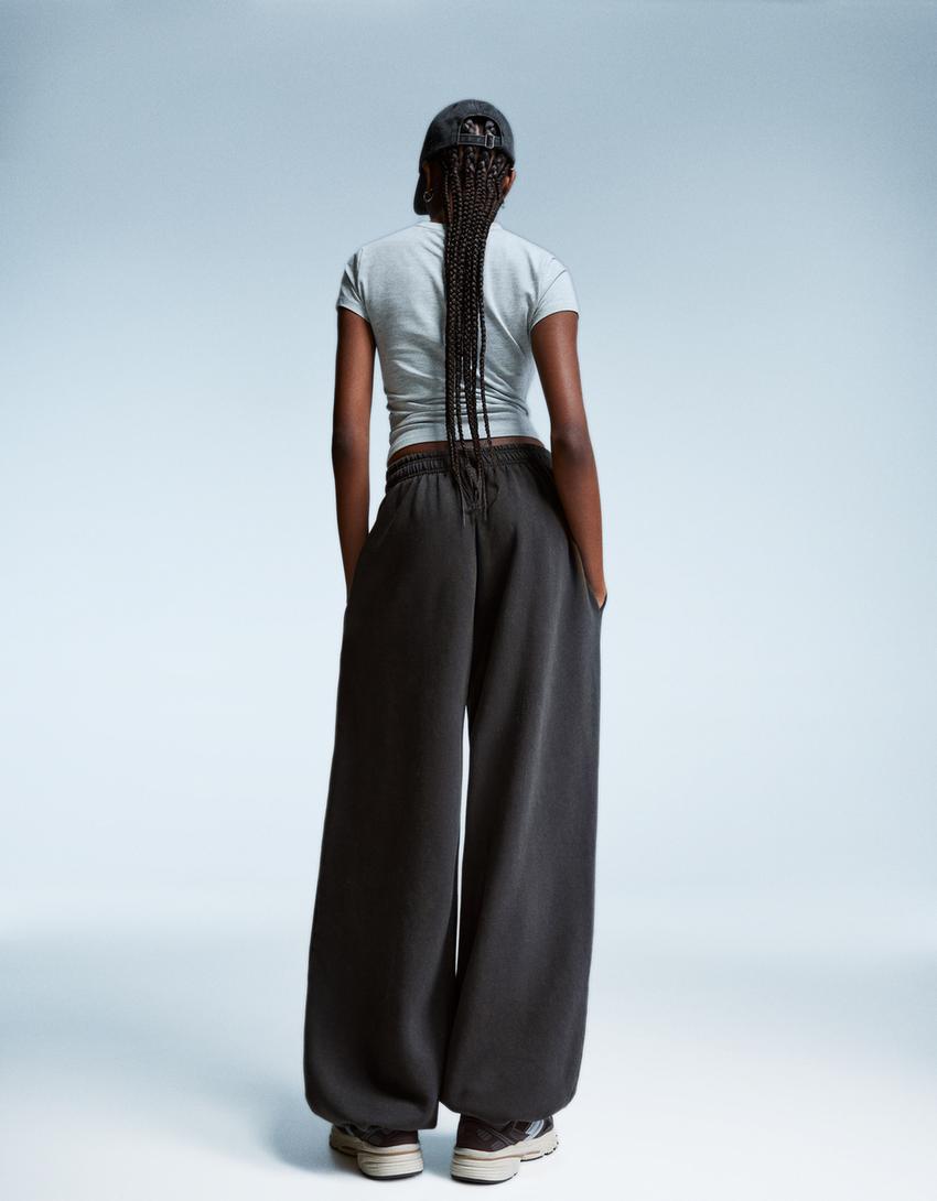 PANTALON JOGGER FIT EN MOLLETON À STOPPERS