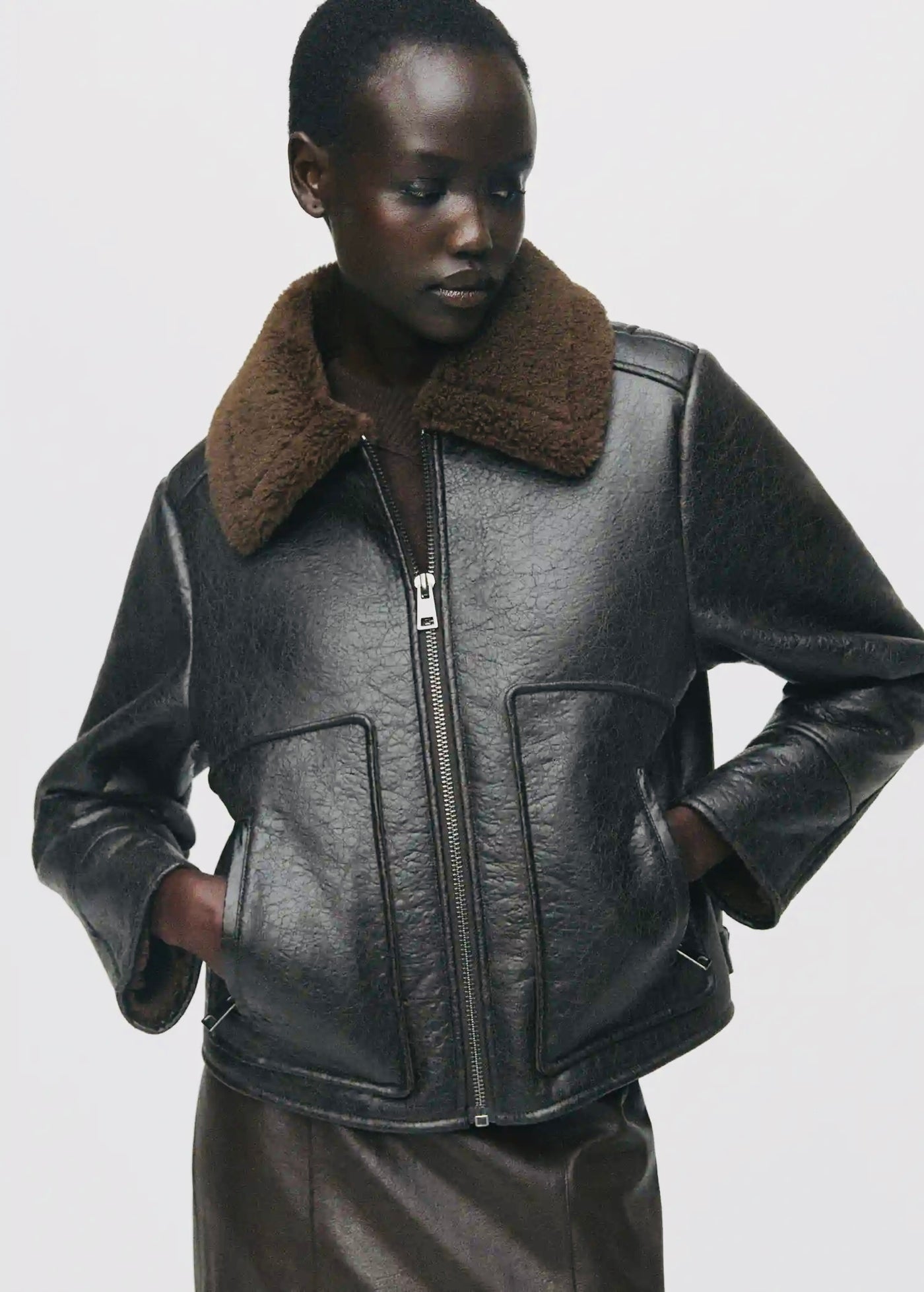 Veste similicuir col effet mouton