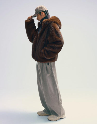 Blouson fausse fourrure à capuche